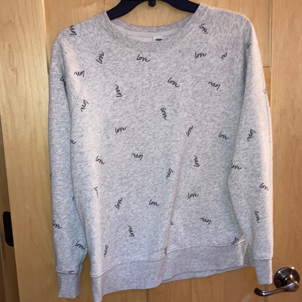 grey crew neck with love on it